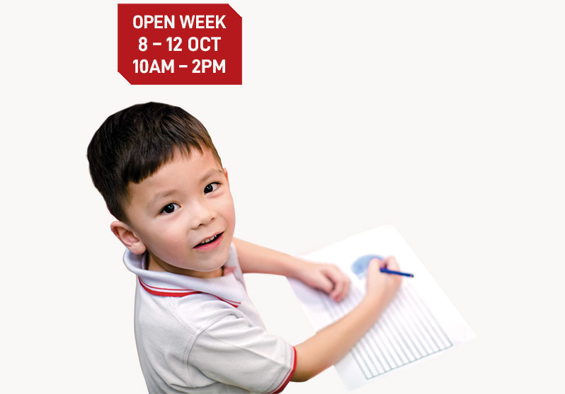 Boy Drawing and Writing