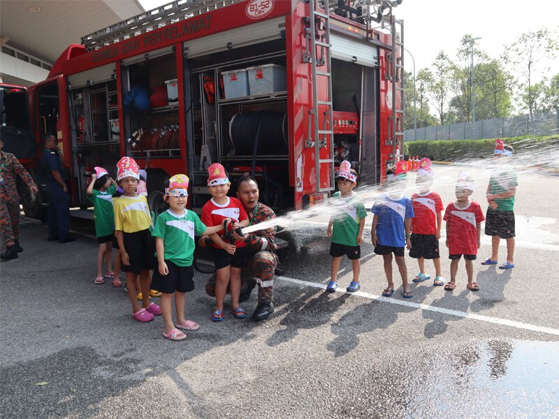 Early Years experiencing the firefighting truck