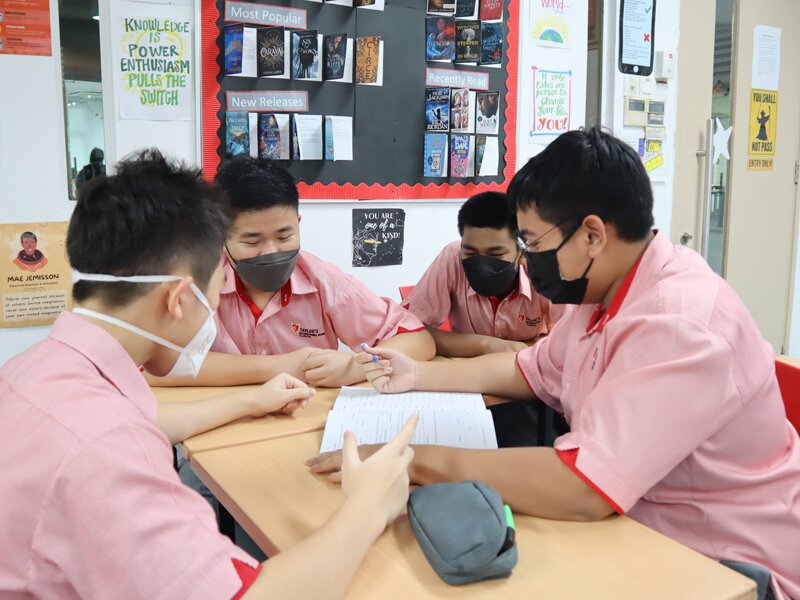 Secondary students in a discussion