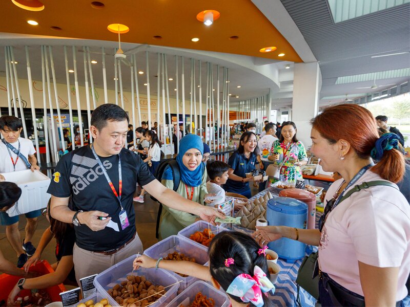 Parents and Teachers purchasing items from the carnival