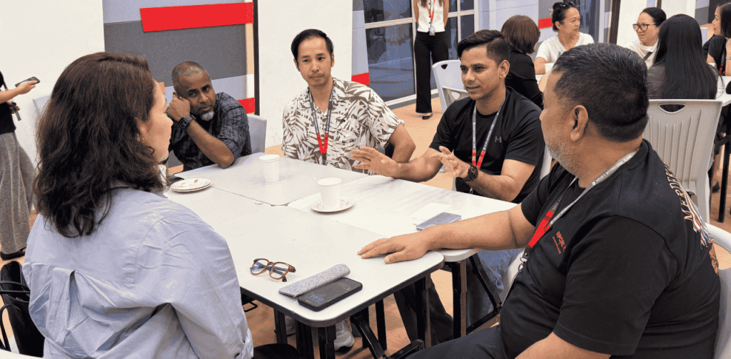 Parents in group discussion on digital habits and supporting children’s wellbeing at Taylor’s International School Kuala Lumpur.