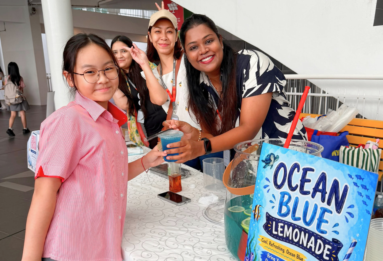 Parents and students at an ocean-themed beverage booth during Ocean Week 2026 at Taylor’s International School Puchong.