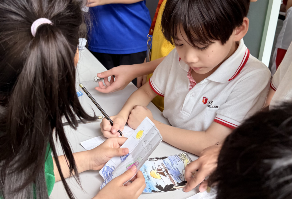 Students participate in a hands-on learning activity during Ocean Week 2026 at Taylor’s International School Puchong, encouraging collaboration and environmental awareness.