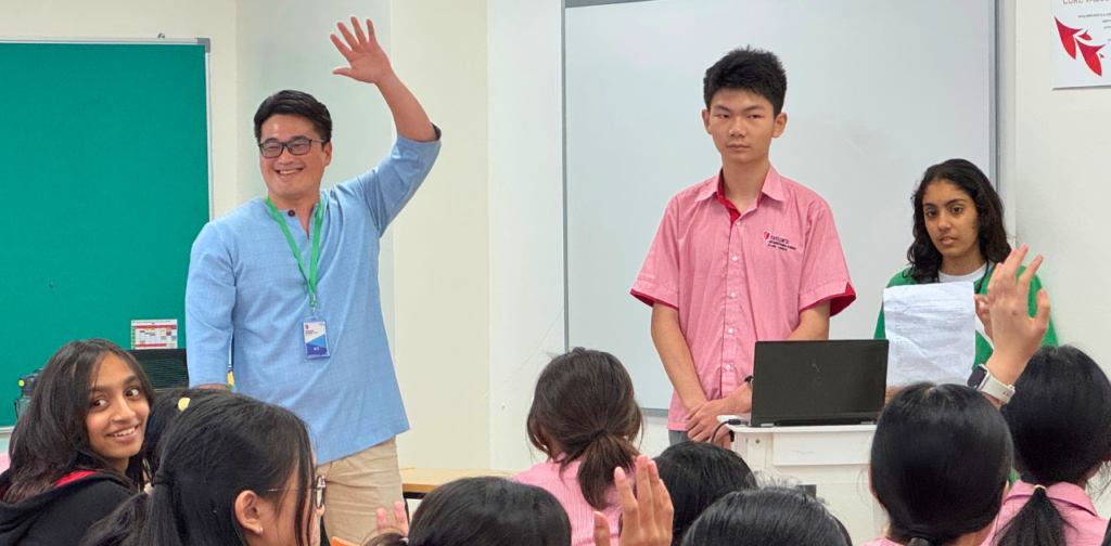 Shannon Teoh engaging with TISKL students during an interactive journalism discussion.